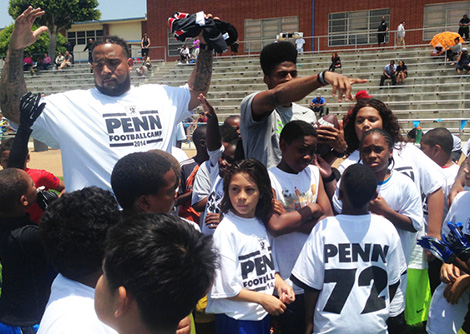 Donald Penn coaching the children